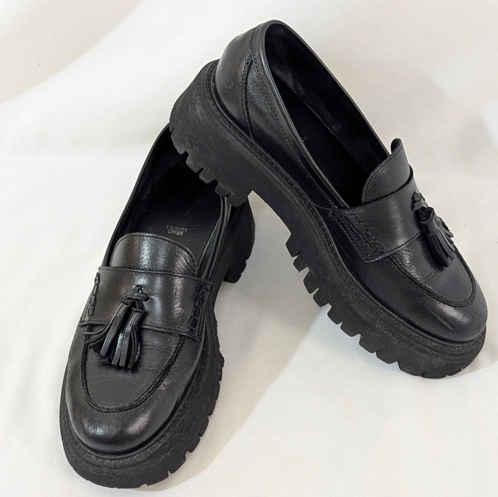 schuh Lastri Leather Chunky Loafers in Black with Tassels